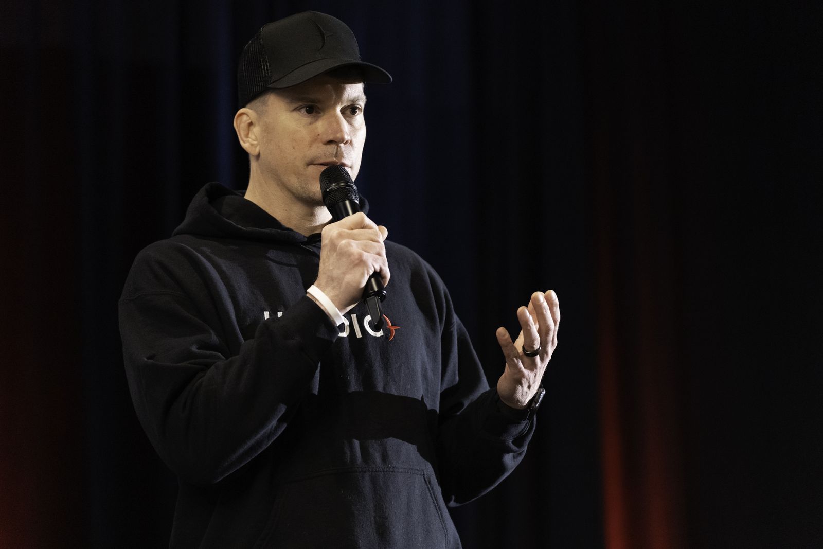 Mark Walker speaking on stage